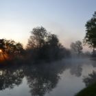 Lever de soleil au milieu de la brume